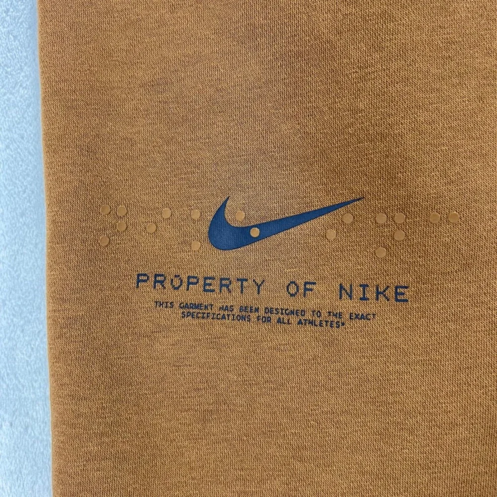 NIKE‎ Sportswear Club Cuffed Fleece Pants Mens Large Brown IM7828-235 Graphic